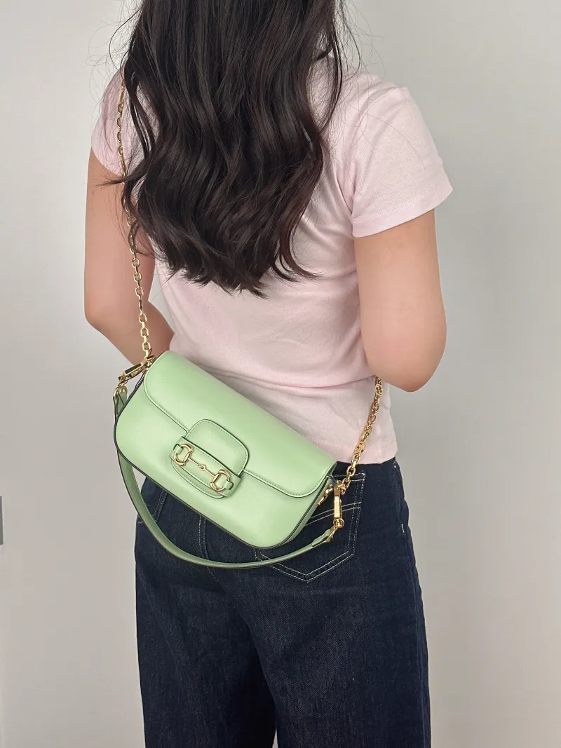 GUCCI Crossbody Bag Horsebit 1955 Horsebit Small Calfskin Small 24 × 5.5 × 13 cm — on-model view 1 of 2