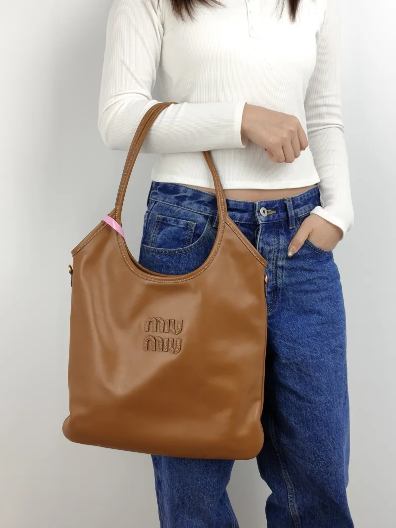 Miumiu Shoulder Bag IVY Tote Shopping Tote CC alfskin Medium 35*40 — on-model view 1 of 2