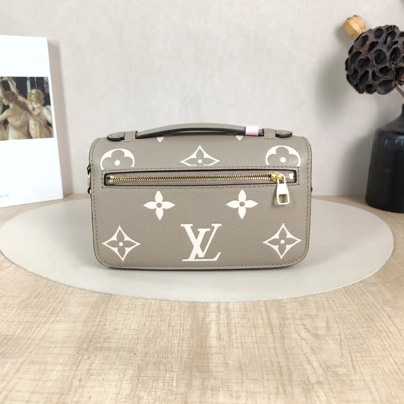Louis Vuitton Crossbody Bag Pochette Métis East West Monogram Empreinte Embossed Calfskin Small 21.5 × 6 × 13.5 cm — cover view 3 of 5