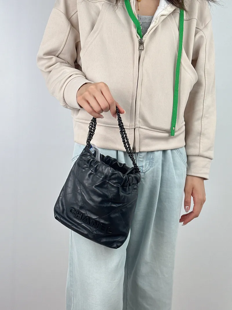 Chanel Shoulder Bag22Bag Black CC alfskinmini20 × 6 × 19 cm — on-model view 2 of 2