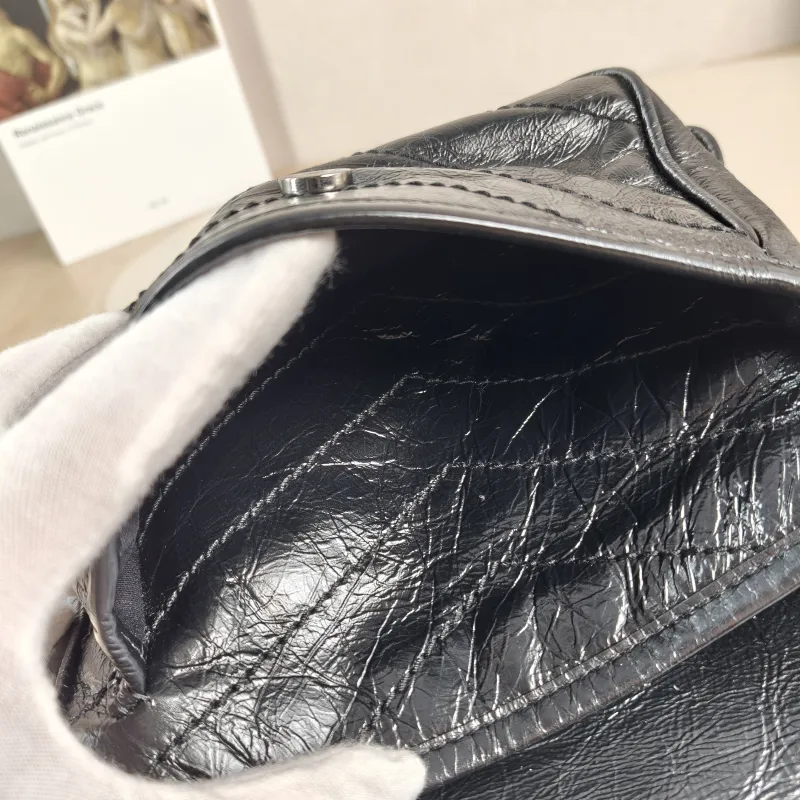 SAINT LAURENT Crossbody Bag Niki Black Waxed Leather Calfskin Small 21 × 7.5 × 16 cm — detail view 10 of 13