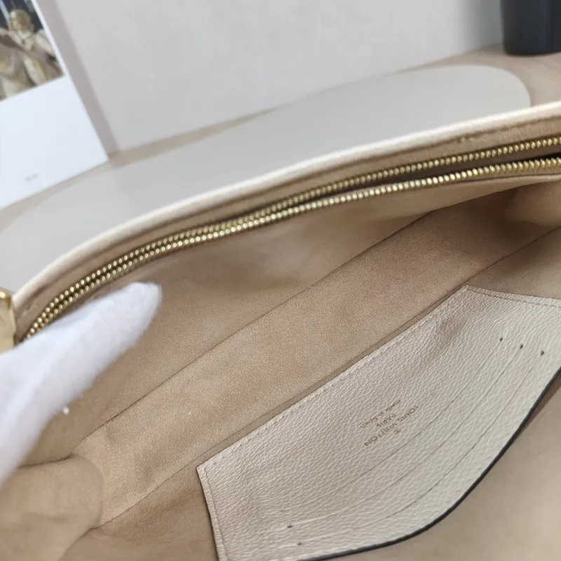 Louis Vuitton Crossbody Bag IVY White Monogram Empreinte Embossed Calfskin Small 23.5 × 4.3 × 12 cm — detail view 2 of 11