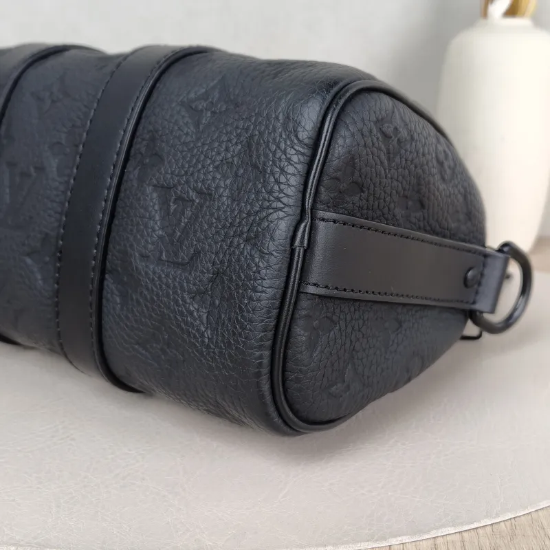 Louis Vuitton Crossbody Bag Keepall 25 Taurillon Monogram Embossed Calfskin Medium 25 × 11 × 15 cm — detail view 3 of 11