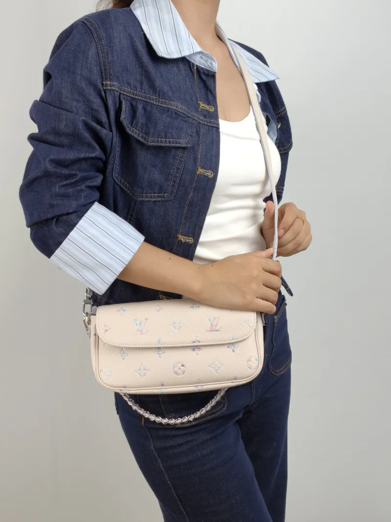 Louis Vuitton Crossbody Bag IVY Calfskin Small 23.5 × 4.3 × 12 cm — on-model view 1 of 2