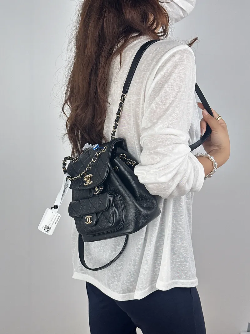 Chanel Backpack Duma Black Calfskin Small18 × 12 × 18.5 cm — on-model view 2 of 3