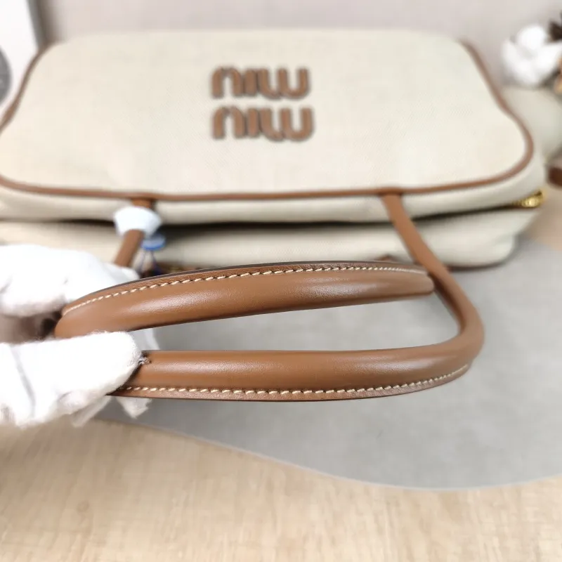 Miumiu Top Handle Bag Beau Brown Canvas · Calfskin Large 34 × 10 × 20 cm — detail view 12 of 12