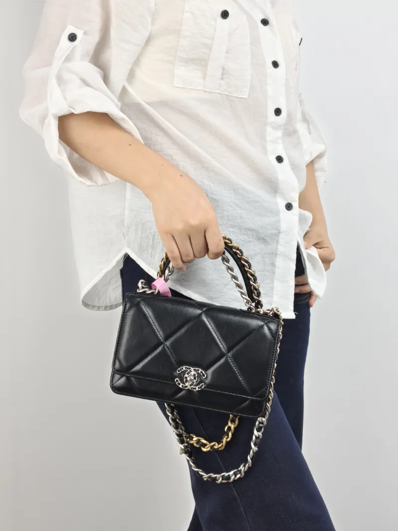 Chanel Crossbody Bag 19Bag WOC Black SL ambskin Mini 19.2 × 3.5 × 12.3 cm — on-model view 1 of 2