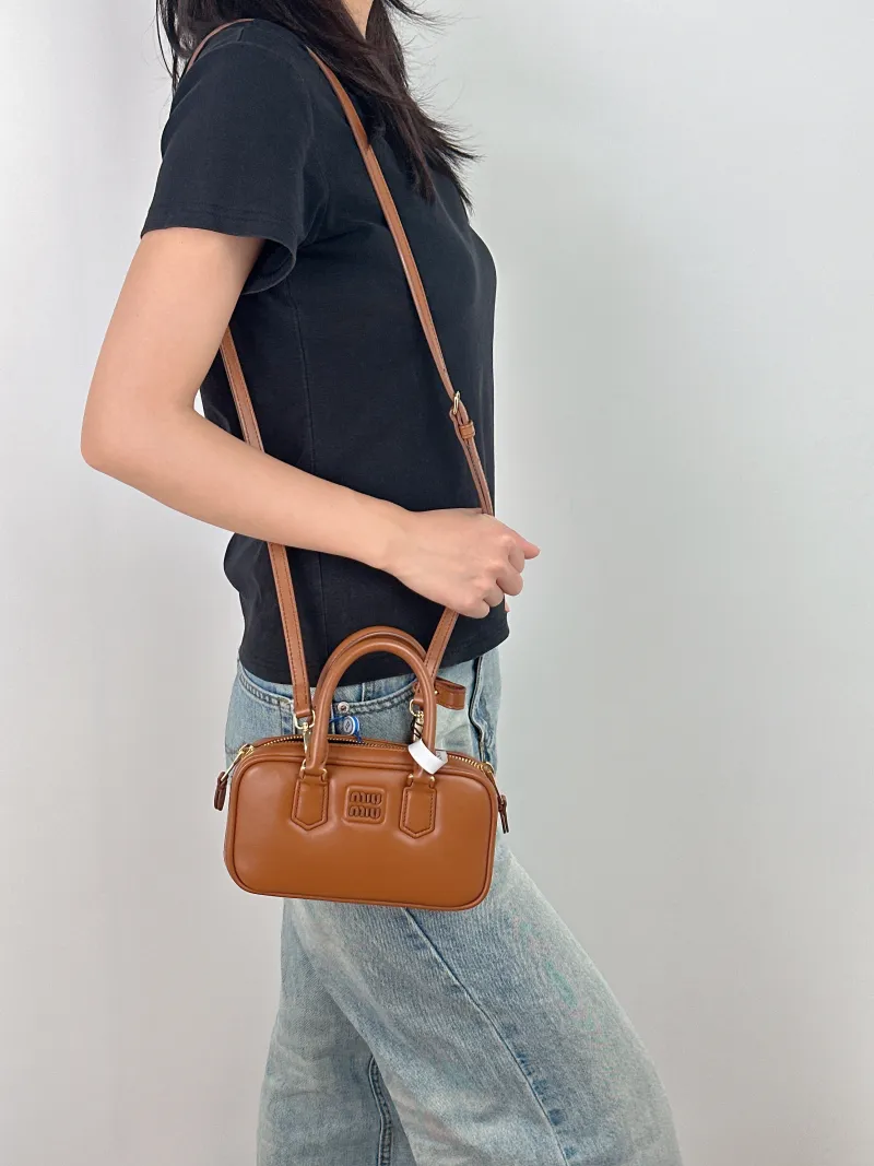 Miumiu Top Handle Bag Arcadie Collection Bowling Bag CC alfskinmini19 × 5 × 10 cm — on-model view 1 of 3