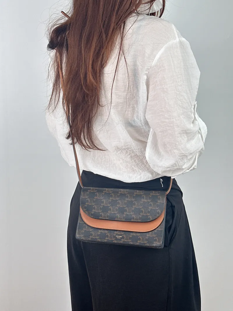 CELINE Crossbody Bag TRIOMPHE Clutchwoc Monogram PVC 20 × 6 × 12 cm — on-model view 2 of 2