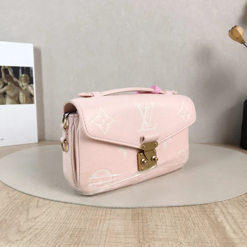 Louis Vuitton Crossbody Bag Pochette Métis East West Monogram Empreinte Embossed Calfskin Small 21.5 × 6 × 13.5 cm — cover view 3 of 5
