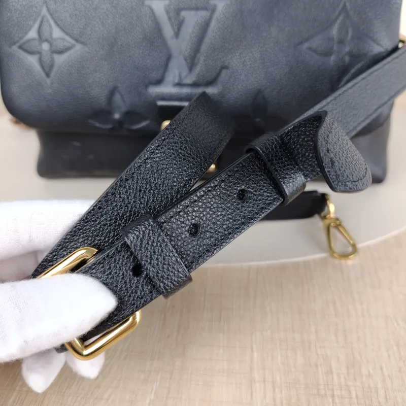 Louis Vuitton Crossbody Bag MADELEINE Black Monogram Empreinte Embossed Calfskin Medium 30 × 11 × 19.5 cm — detail view 4 of 13