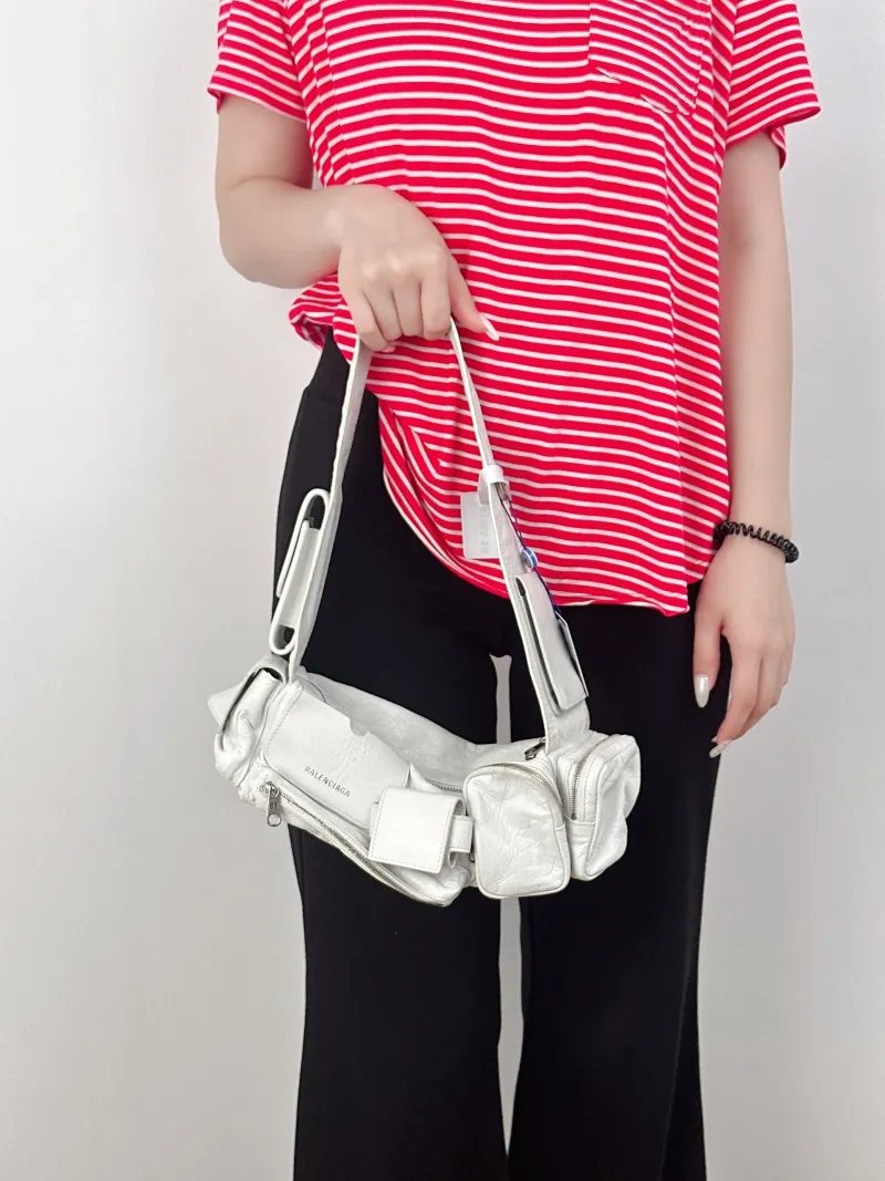 BALENCIAGA Top Handle Bag Superbusy Top Handle Bag White Lambskinmini 35 × 11 × 12 cm — on-model view 1 of 2