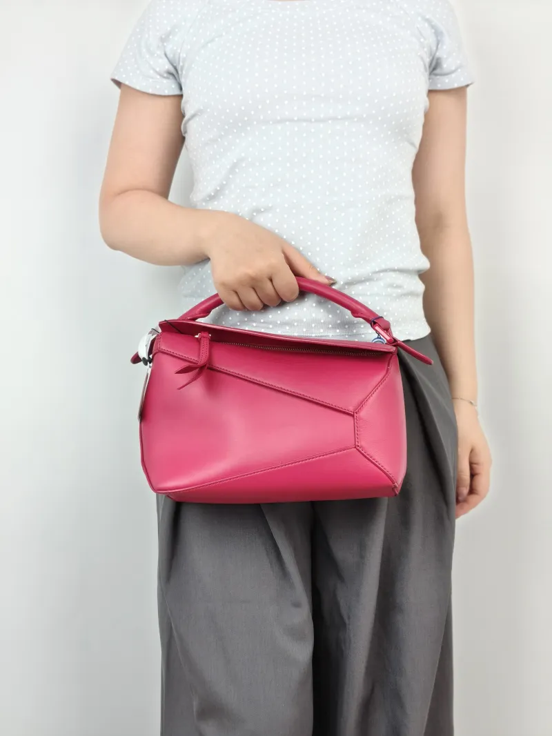 LOEWE Crossbody Bag Puzzle Red CC alfskin Small24 × 10.5 × 16.5 cm — on-model view 1 of 3