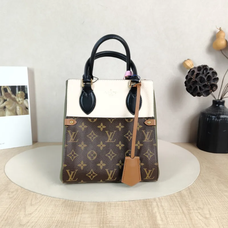 Louis Vuitton Top Handle Bag Fold Tote Colorblock PVC · Calfskin Small 20 × 18 × 22 cm