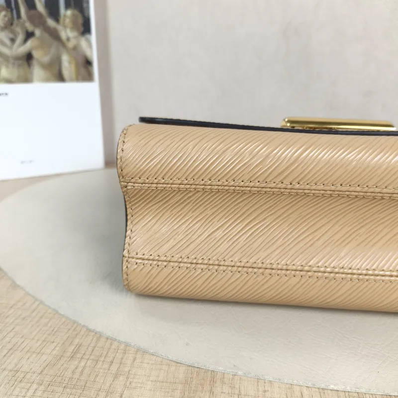 Louis Vuitton Crossbody Bag Twist Taupe Epi Embossed Calfskin Medium 23 × 9.5 × 17 cm — detail view 11 of 13