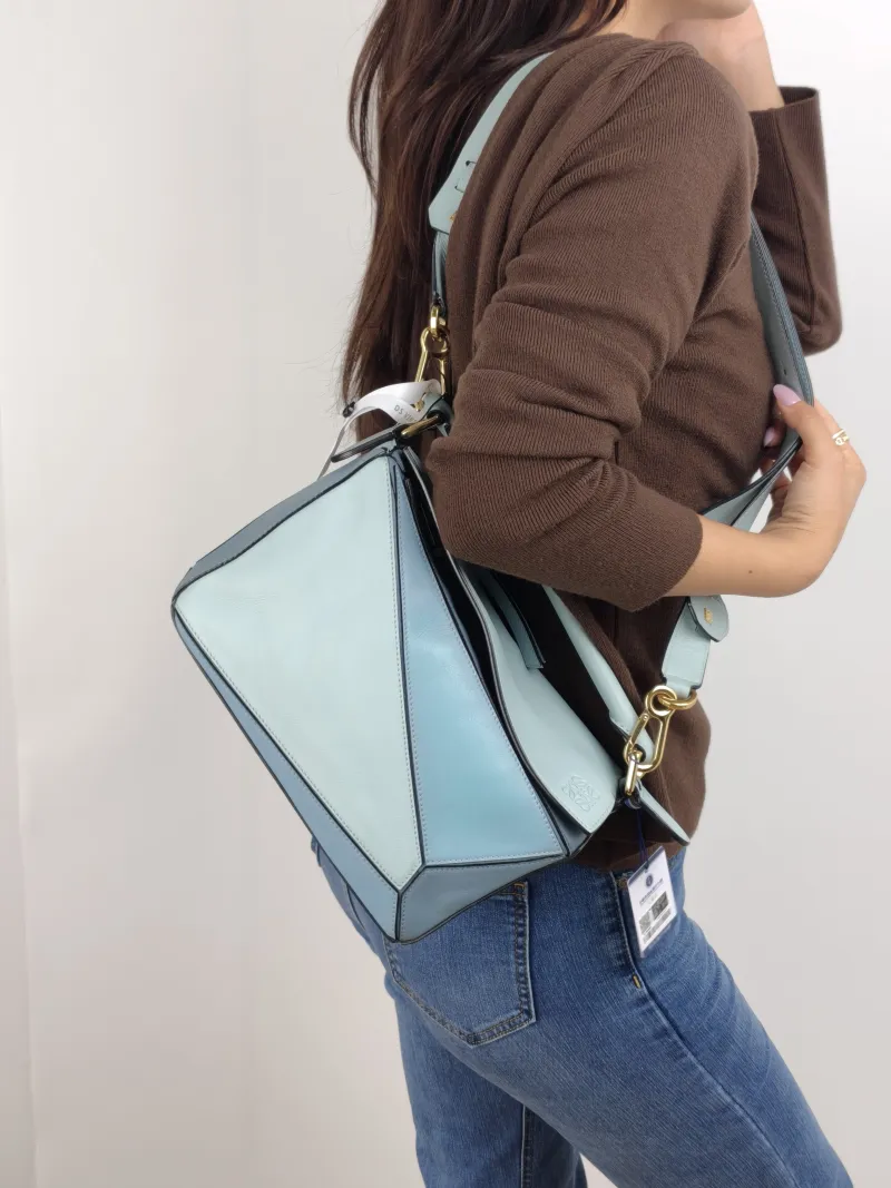 LOEWE Crossbody Bag Puzzle Blue CC alfskin Small 24 × 10.5 × 16.5 cm — on-model view 2 of 2