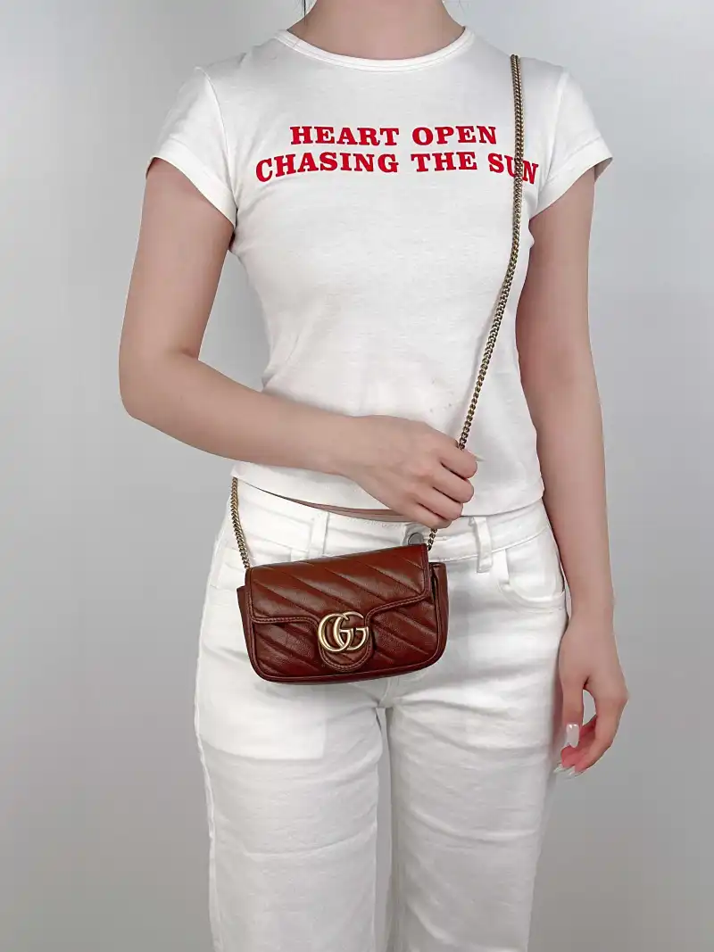GUCCI Crossbody Bag GG Marmont Mini Marmont Mini Caramel Calfskin Mini 16.5 × 4.5 × 9.5 cm — on-model view 1 of 2