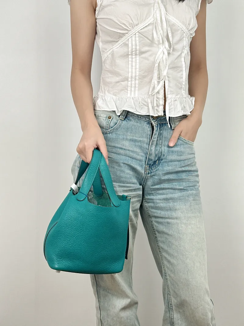 Hermès Top Handle Bag Picotin Lock 18 187F TC Calfskin Small18 × 13 × 18 cm — on-model view 2 of 2