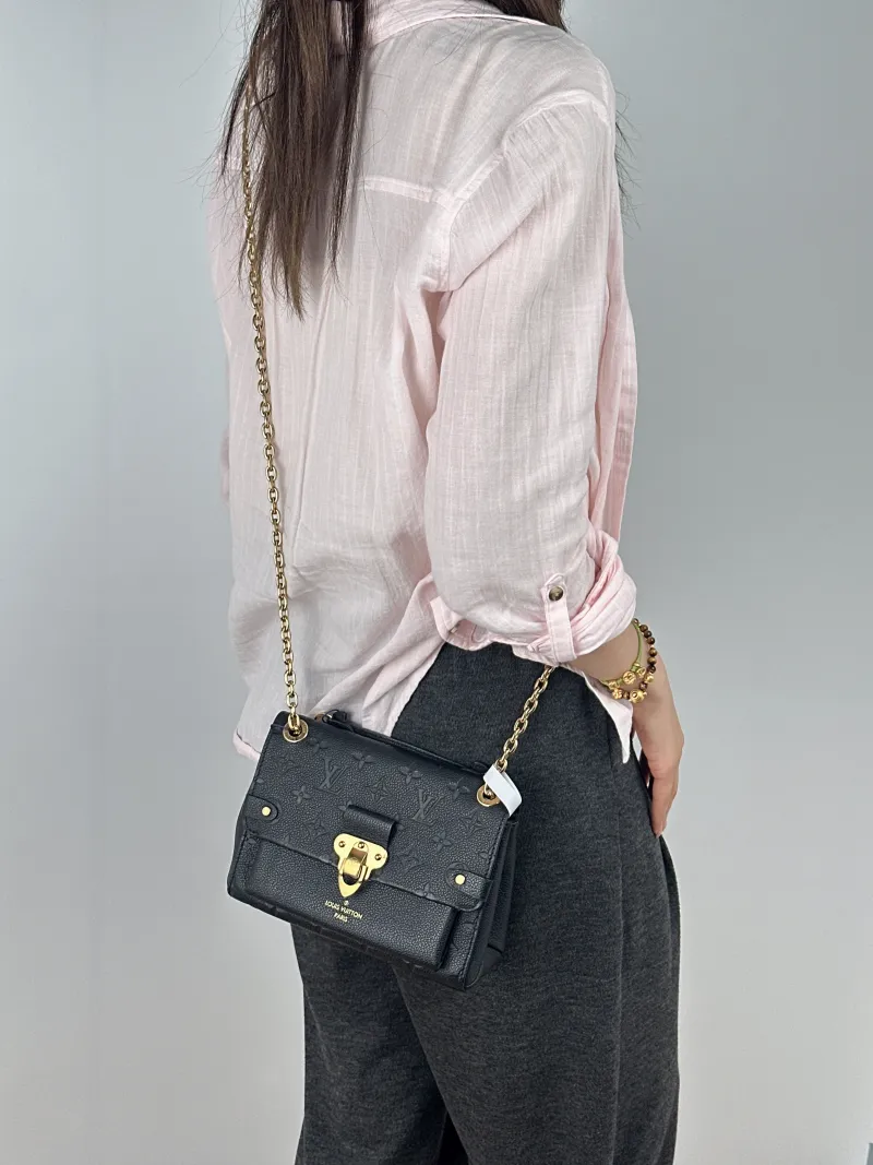 Louis Vuitton Shoulder Bag VAVIN Black Empreinte Embossed Calfskin BB20.5 × 8 × 15.5 cm — on-model view 1 of 2