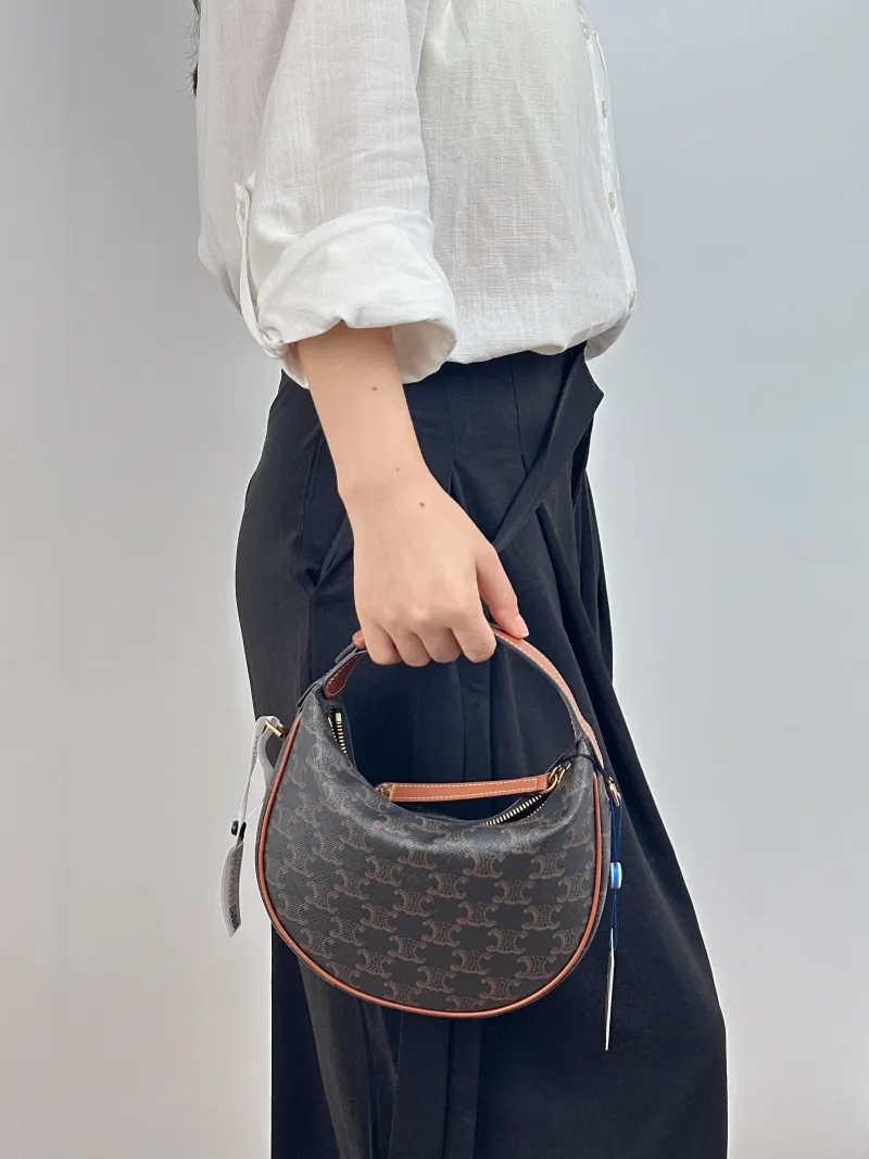 CELINE Crossbody Bag TEEN LULU hobo Monogram PVC 21 × 5 × 18 cm — on-model view 1 of 2