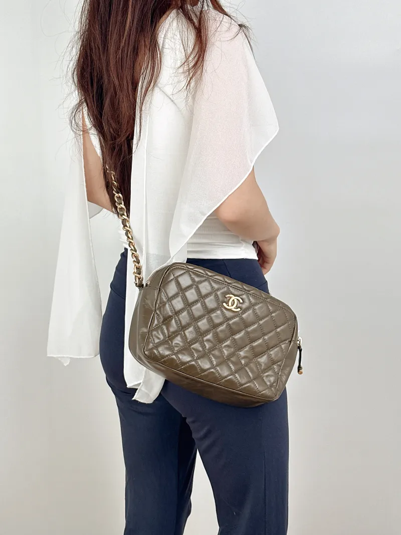 Chanel Crossbody Bag Camera Bag Waxed Leather 22.5 × 9 × 16.5 cm — on-model view 1 of 2