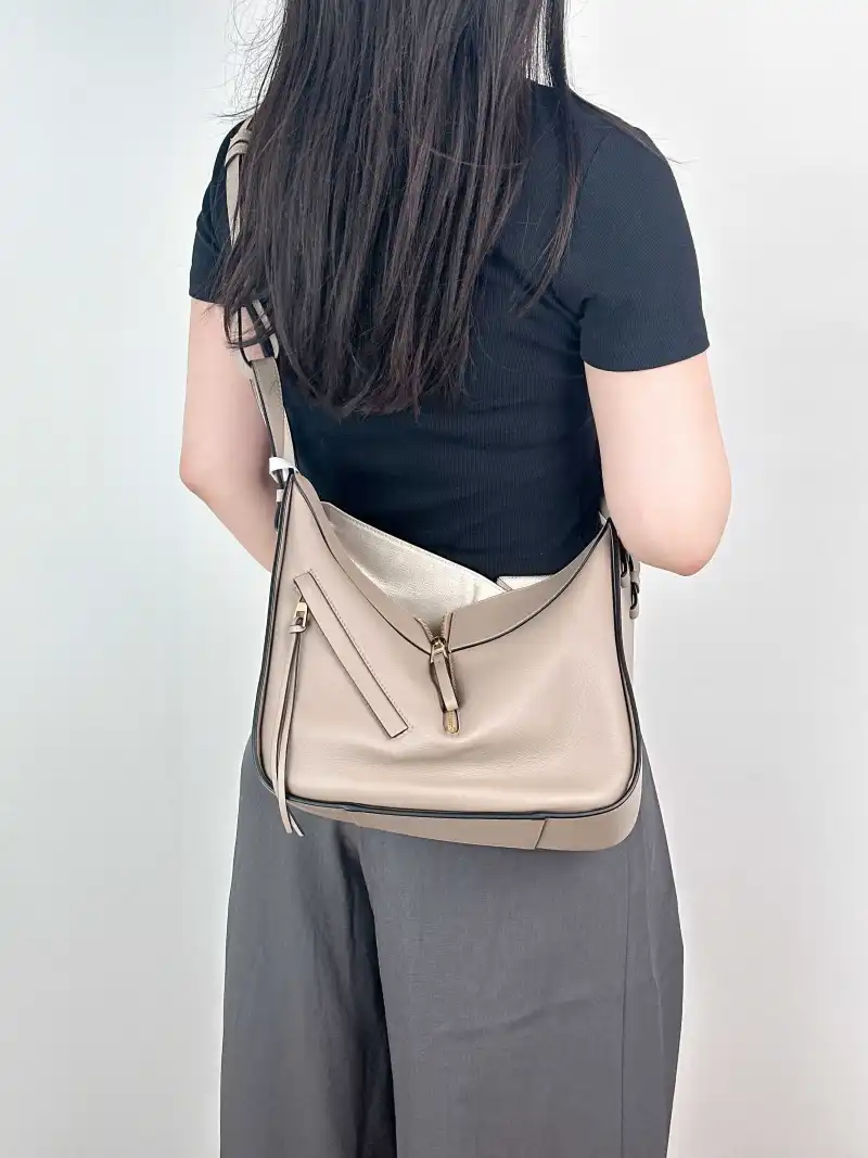 LOEWE Crossbody Bag Hammock Brown Calfskin Medium 29 × 14 × 32 cm — on-model view 2 of 2