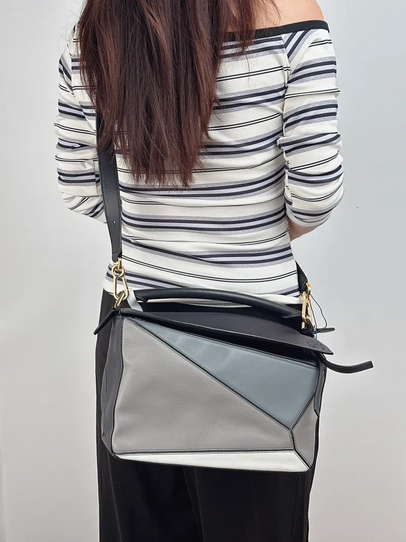 LOEWE Crossbody Bag Puzzle Colorblock Calfskin Medium 29 × 14 × 19.5 cm — on-model view 1 of 2