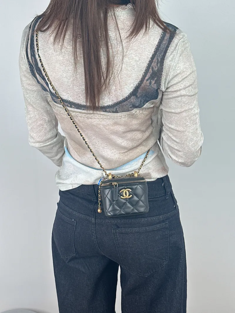 Chanel Crossbody Bag Black Lambskin One Size10 × 7 × 9 cm — on-model view 1 of 2