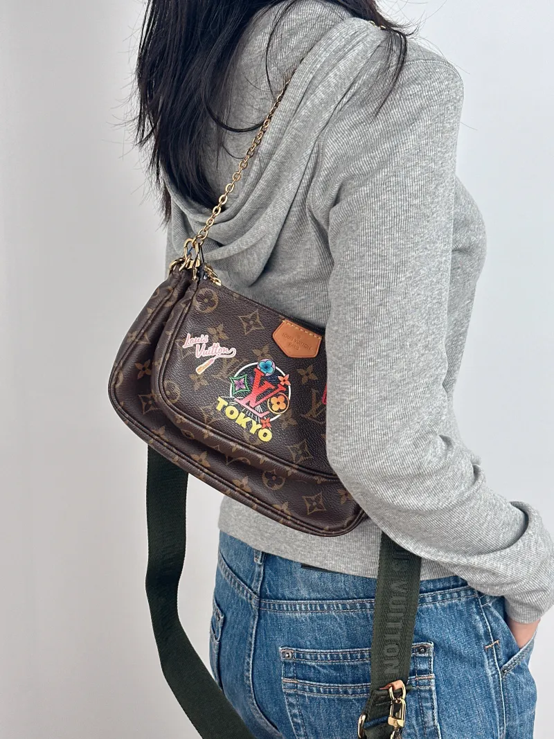 Louis Vuitton Crossbody Bag Multi Pochette Accessoires Shoulder Strap PVC Small 24 × 4 × 13.5 cm — on-model view 1 of 3