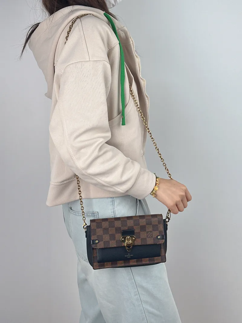 Louis Vuitton Crossbody Bag VAVIN woc Brown PVC Mini 19 × 4 × 12.5 cm — on-model view 2 of 2