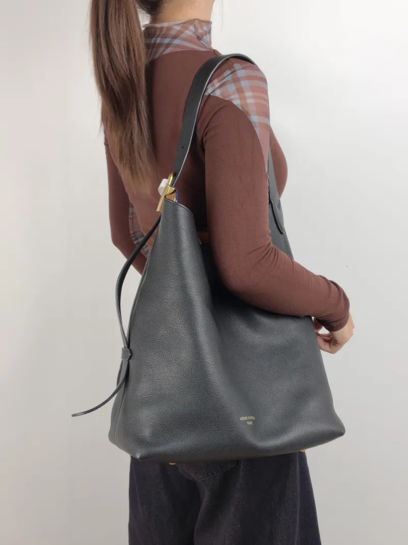 Louis Vuitton Shoulder Bag Low Key Hobo Shoulder Bag Black Calfskin Medium 31 × 18 × 35 cm — on-model view 2 of 2