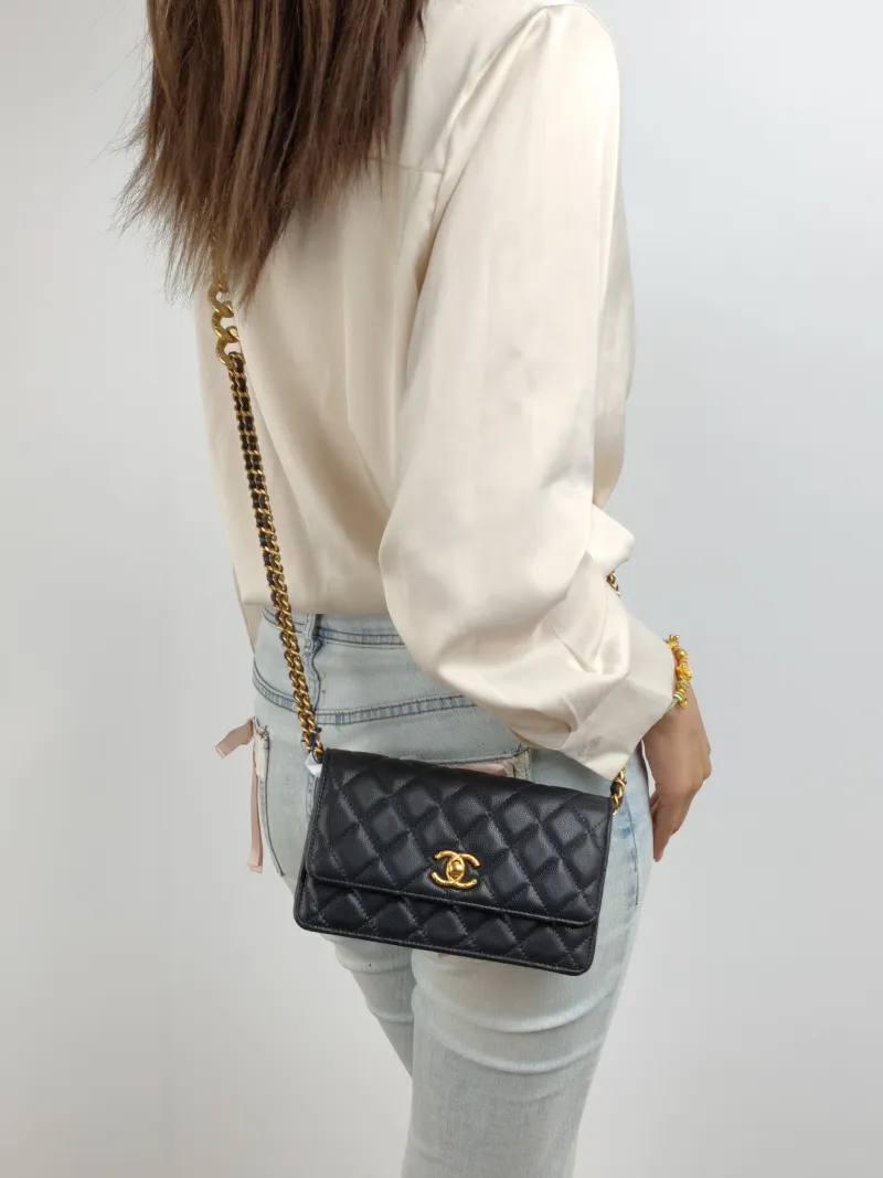 Chanel Crossbody Bag woc Black Calfskin Mini 19 × 6 × 11 cm — on-model view 1 of 2