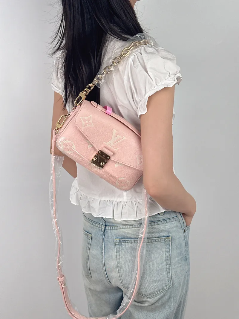 Louis Vuitton Crossbody Bag Pochette Métis East West Monogram Empreinte Embossed Calfskin Small 21.5 × 6 × 13.5 cm — on-model view 3 of 4