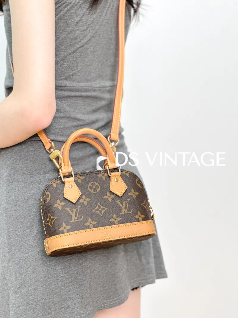 Louis Vuitton Crossbody Bag Alma Nano Monogram PVC nano 18 × 8 × 12 cm — on-model view 3 of 3