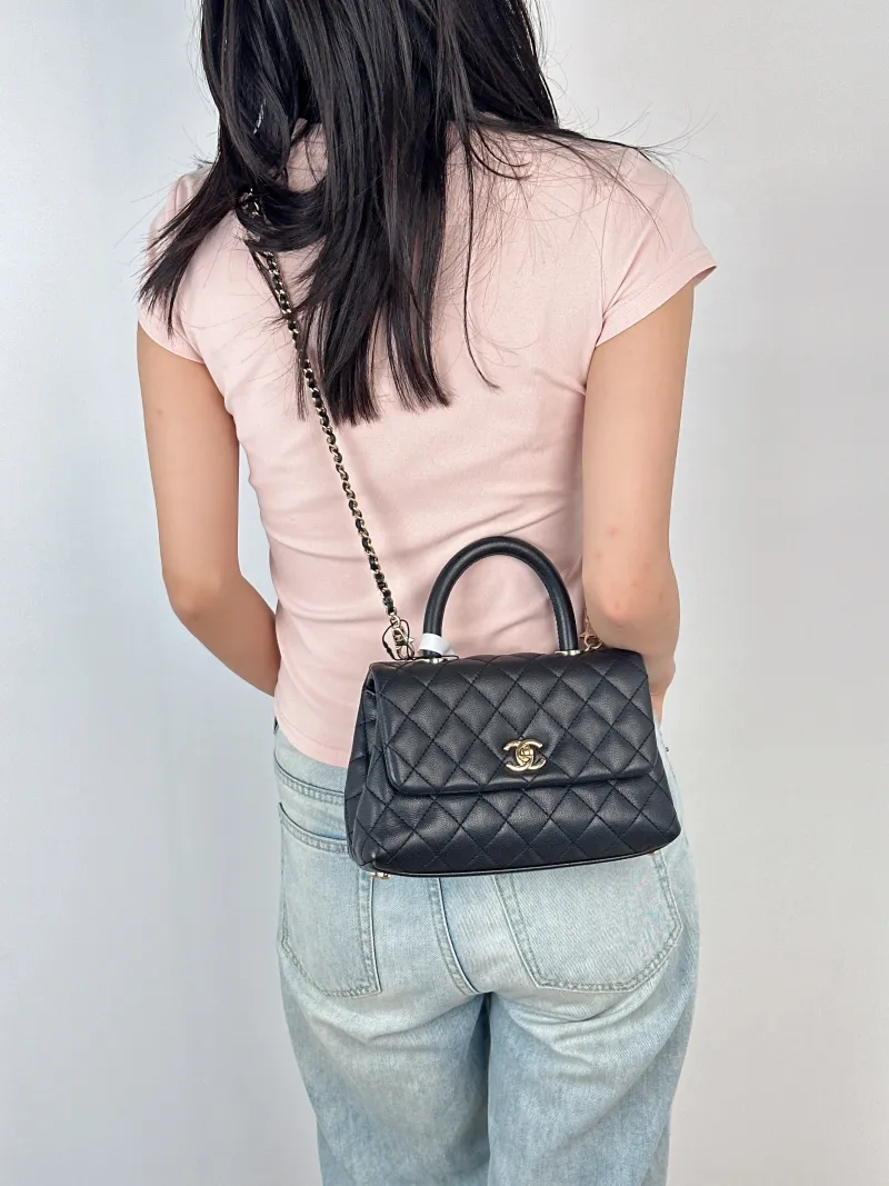 Chanel Top Handle Bag Coco Handle​Black Grained Calfskin Small24 × 10 × 14 cm — on-model view 1 of 6