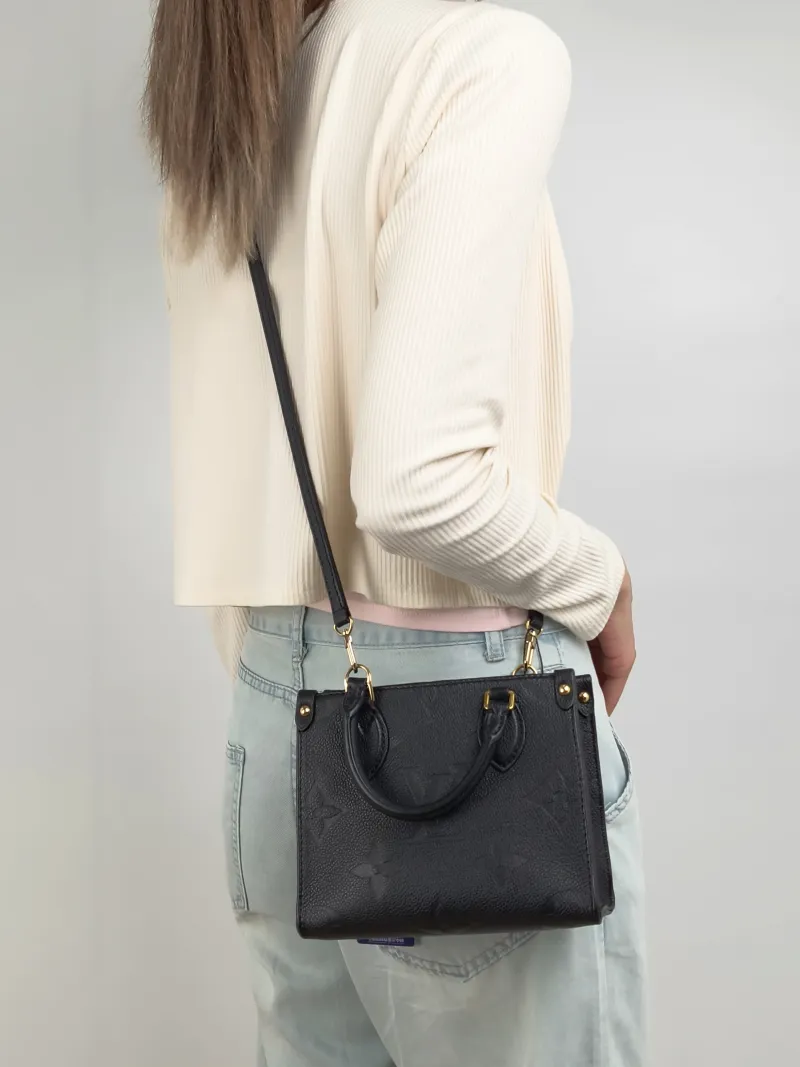 Louis Vuitton Crossbody Bag Onthego BB Black Empreinte Embossed Calfskin Monogram BB18 × 8.5 × 15 cm — on-model view 3 of 3