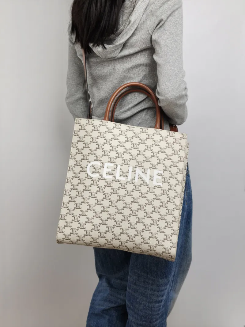 CELINE Crossbody Bag CABAS White Monogram PVC Medium 31.5 × 5 × 35 cm — on-model view 1 of 3