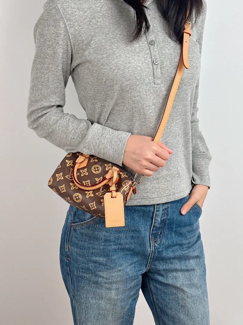 Louis Vuitton Crossbody Bag Speedy Nano Brown PVC nano 16 × 7.5 × 10 cm — on-model view 3 of 3