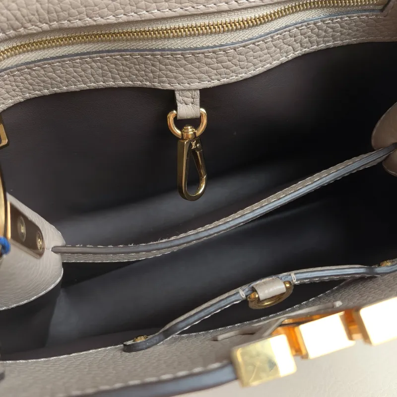 Louis Vuitton Top Handle Bag Capucines Grey Calfskin BB 27 × 9 × 17.5 cm — detail view 9 of 11