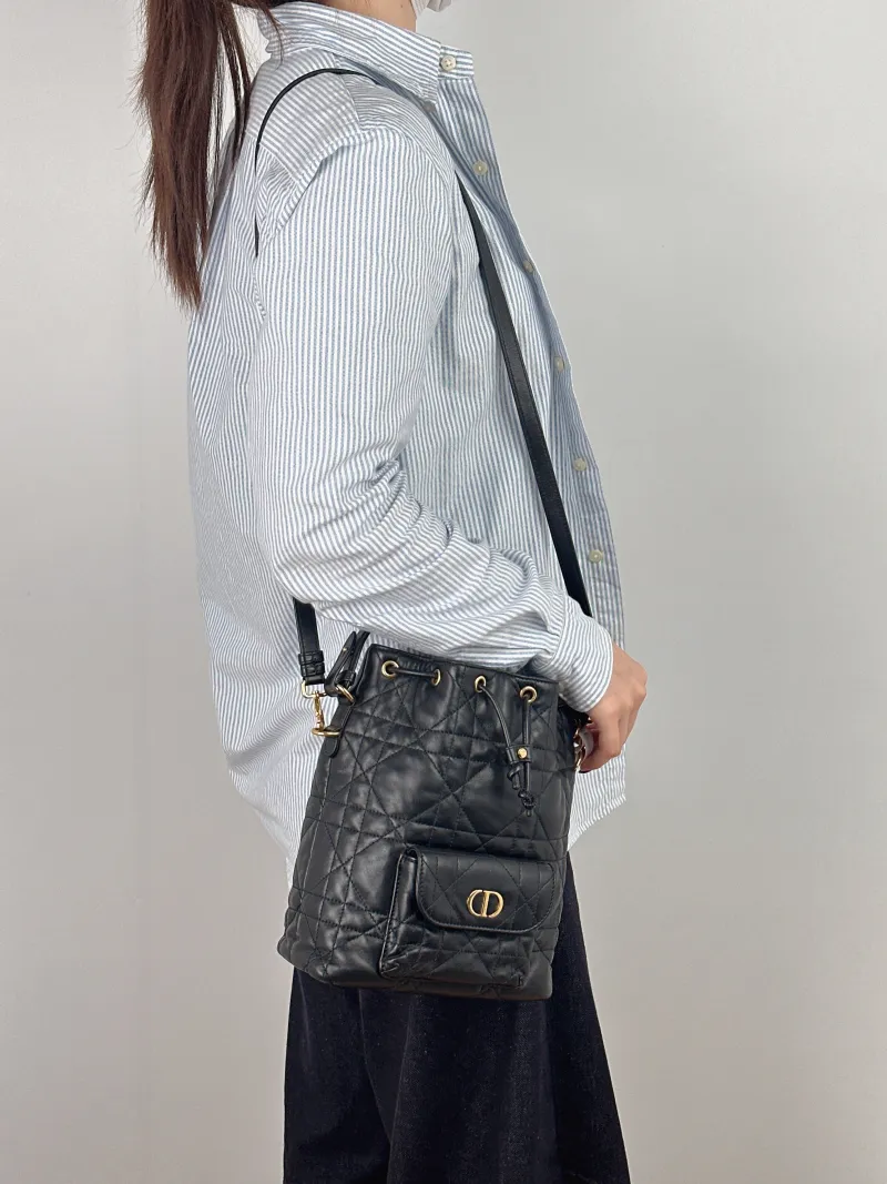 DIOR Crossbody Bag Caro Bucket Bag Black Lambskin Small 20 × 9 × 24 cm — on-model view 1 of 3