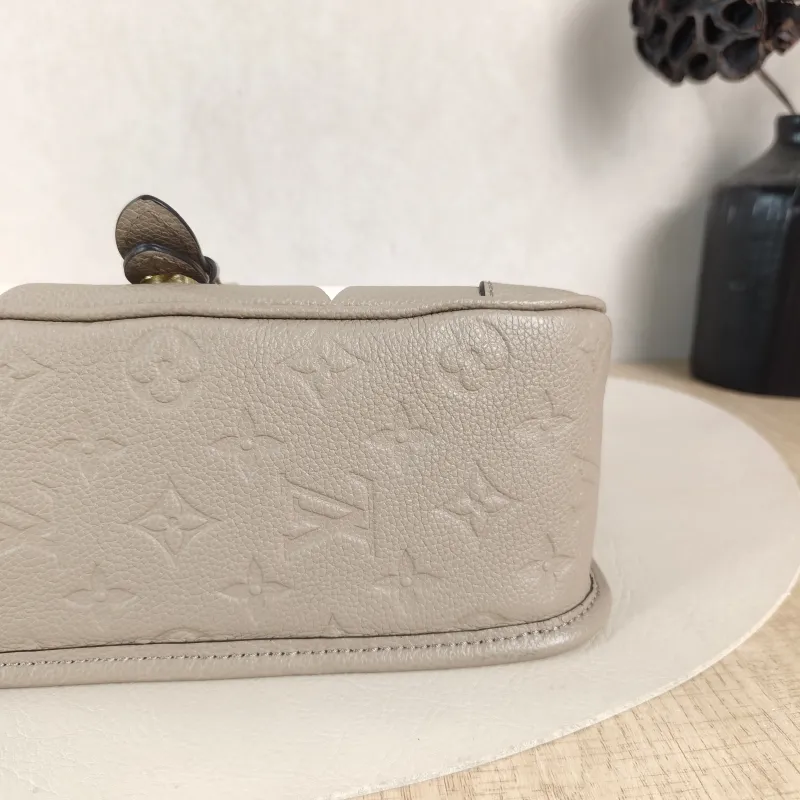 Louis Vuitton Crossbody Bag Diane Baguette Bag Monogram Empreinte Embossed Calfskin Small 24 × 9 × 15 cm — detail view 10 of 13