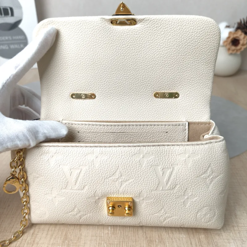 Louis Vuitton Crossbody Bag MADELEINE White Empreinte Embossed Calfskinnano21 × 6 × 12.5 cm — detail view 7 of 14