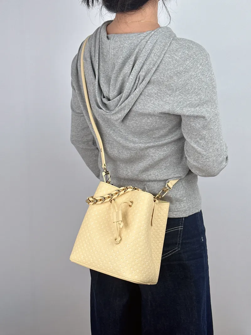 Louis Vuitton Shoulder Bag NÉONOÉ Bucket Bag BB Yellow Calfskin BB 20 × 13 × 20 cm — on-model view 1 of 3