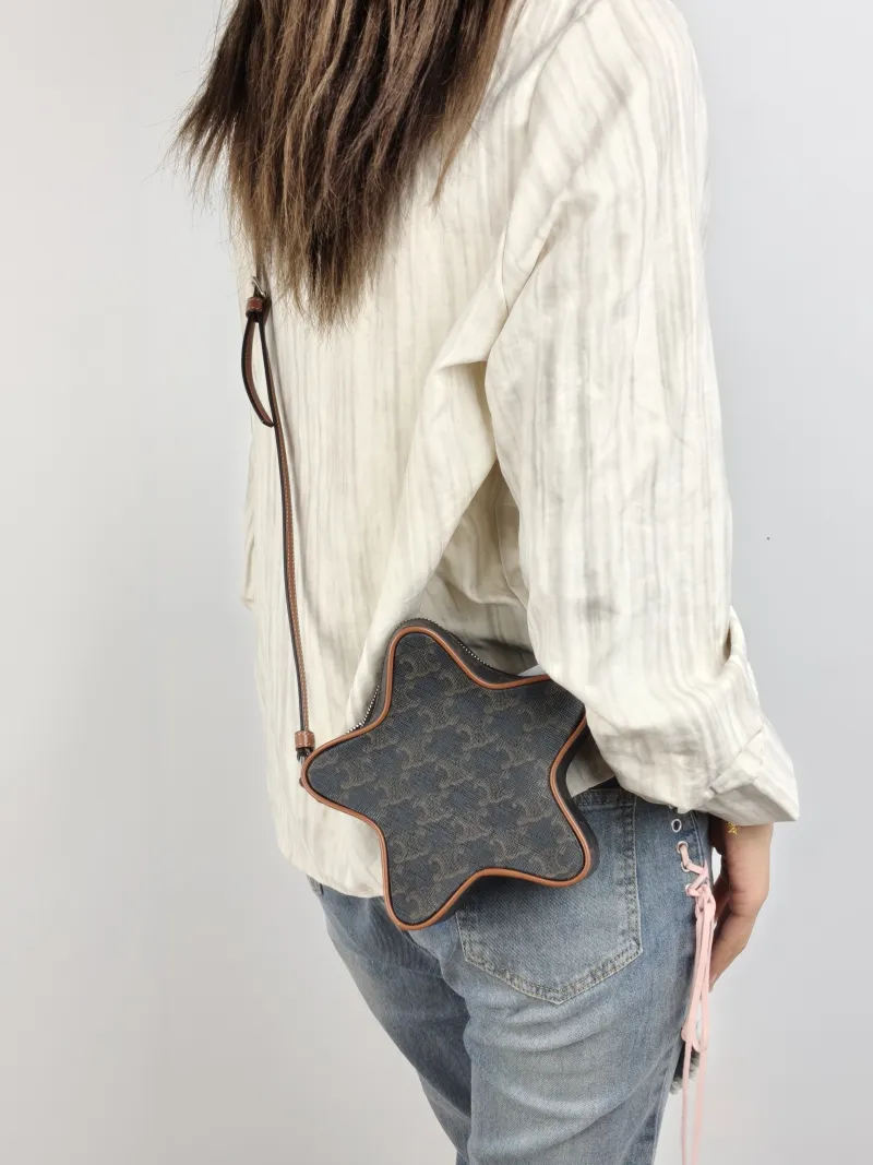 CELINE Crossbody Bag Etoile Monogram PVC Small 18 × 5 × 17 cm — on-model view 2 of 2