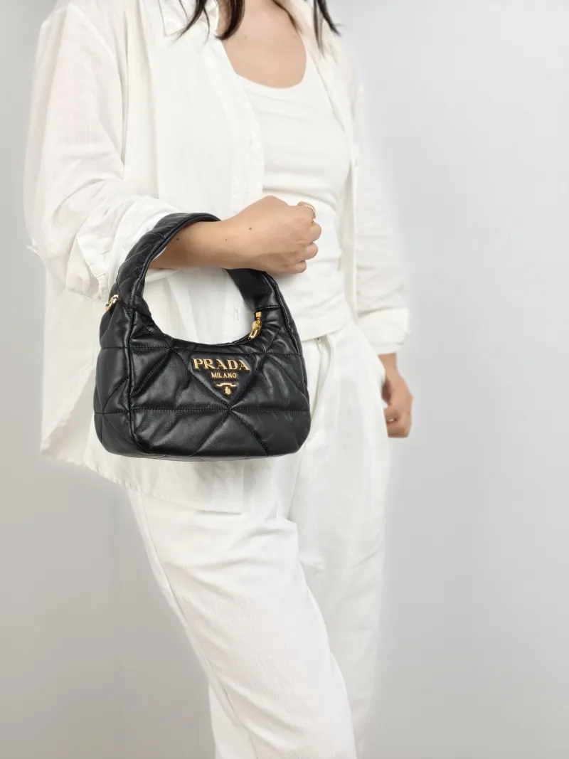 PRADA Shoulder Bag Re-Edition Black Lambskin 22 × 8 × 16 cm — on-model view 3 of 3