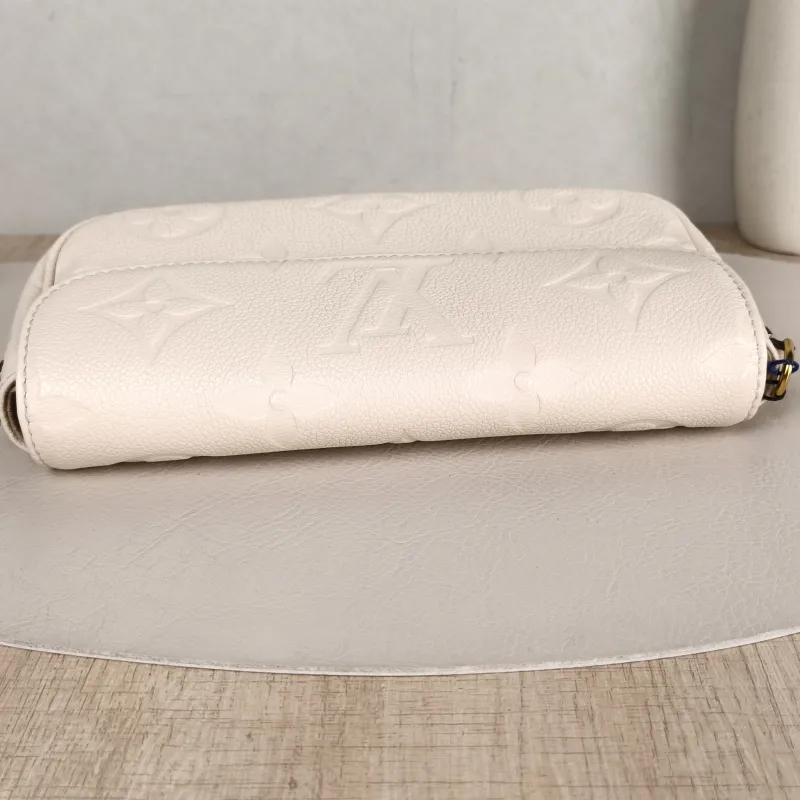 Louis Vuitton Crossbody Bag IVY White Monogram Empreinte Embossed Calfskin Small 23.5 × 4.3 × 12 cm — detail view 9 of 11