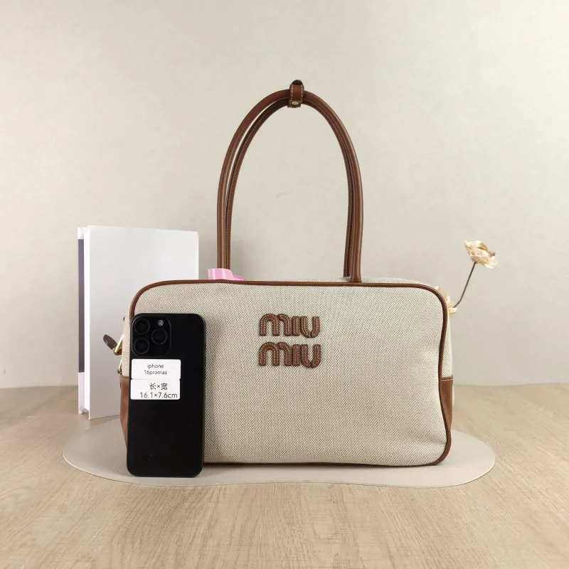 Miumiu Top Handle Bag Beau Brown Canvas · Calfskin Large34 × 10 × 20 cm — cover view 2 of 5