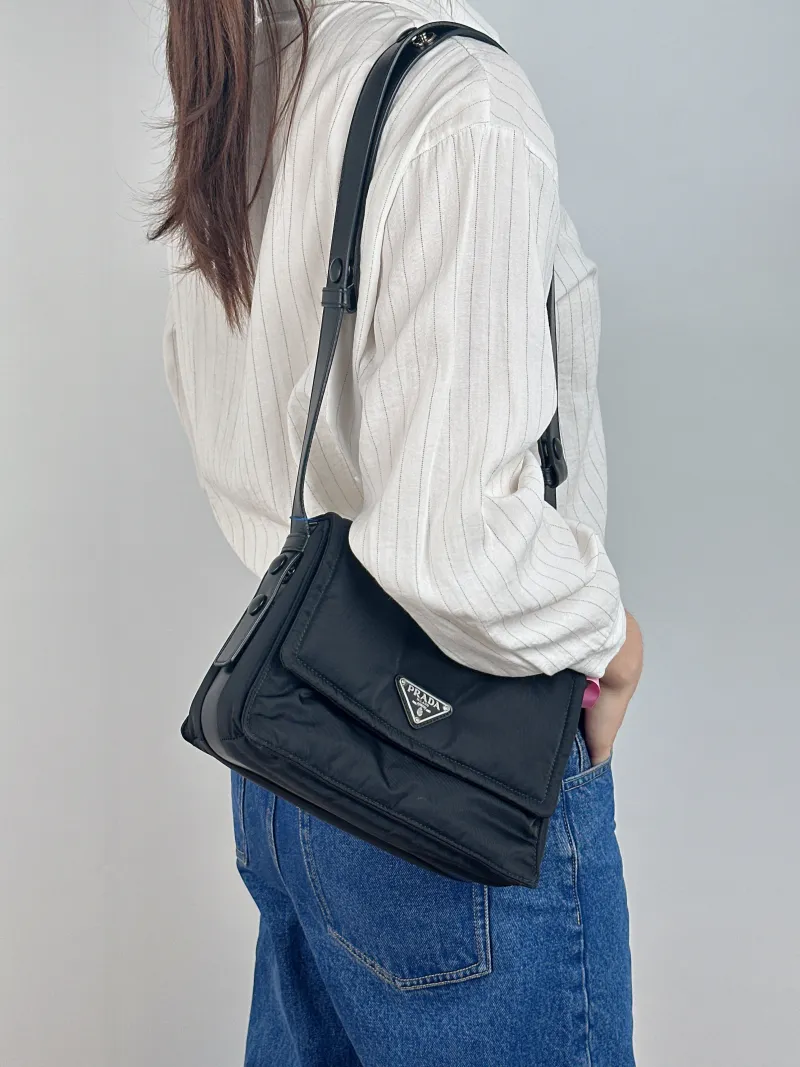 PRADA Shoulder Bag Re-Nylon Shoulder Bag Black Nylon 23 × 11 × 16 cm — on-model view 1 of 2