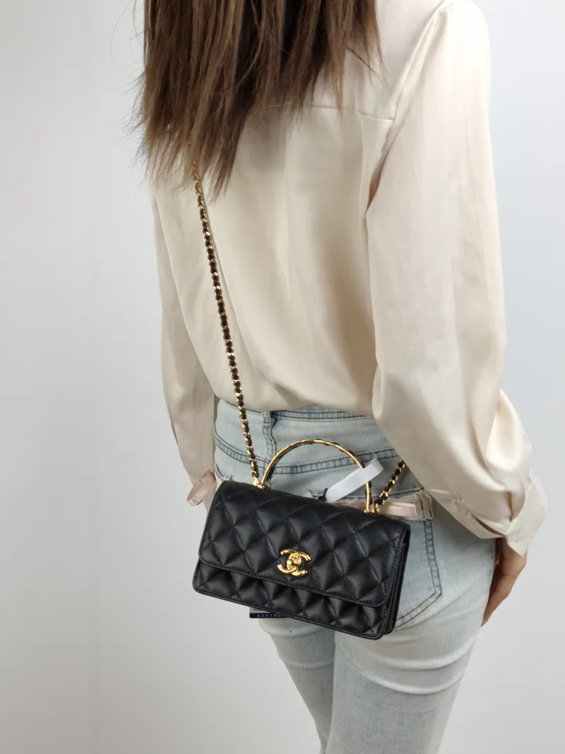 Chanel Crossbody Bag 26p woc Black Calfskin Mini 19 × 7 × 11.5 cm — on-model view 1 of 2