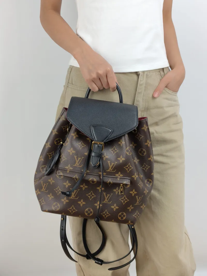 Louis Vuitton Backpack Montsouris Backpack Black PVC · Calfskin Small 27.5 × 14 × 33 cm — on-model view 2 of 3